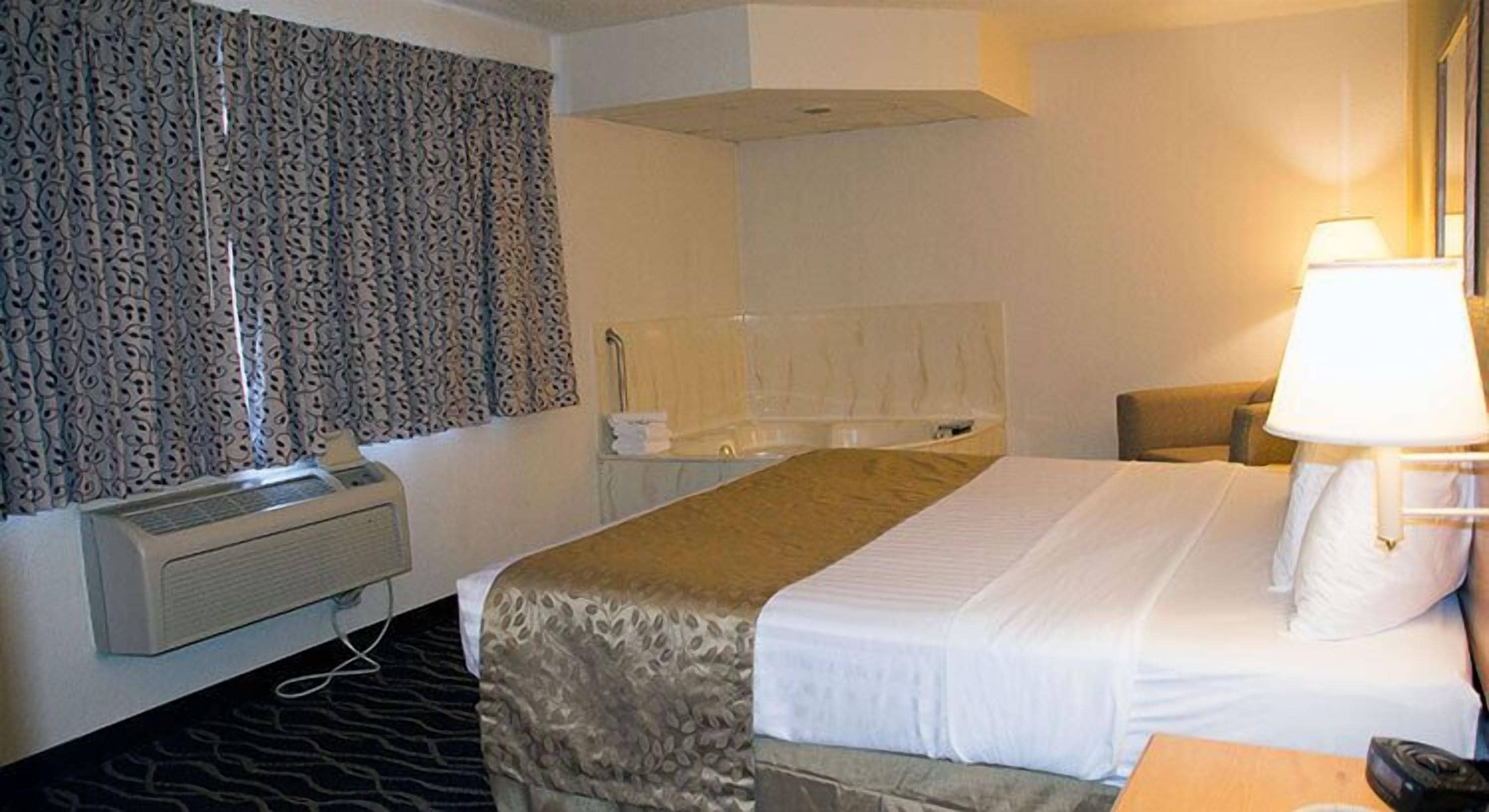 desk, blackout curtains, iron/ironing board, free cots/infant beds