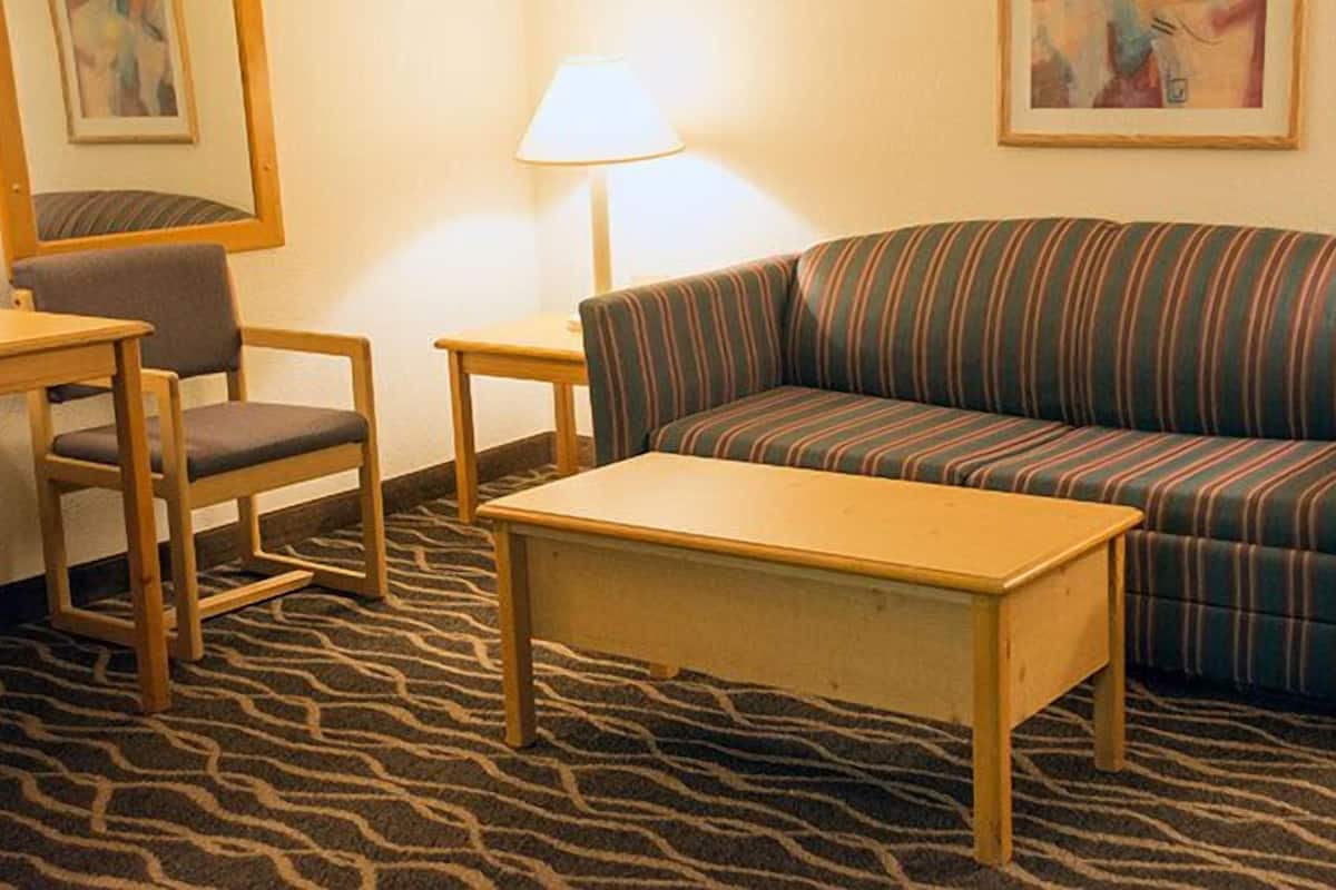 Desk, blackout drapes, iron/ironing board, free cribs/infant beds
