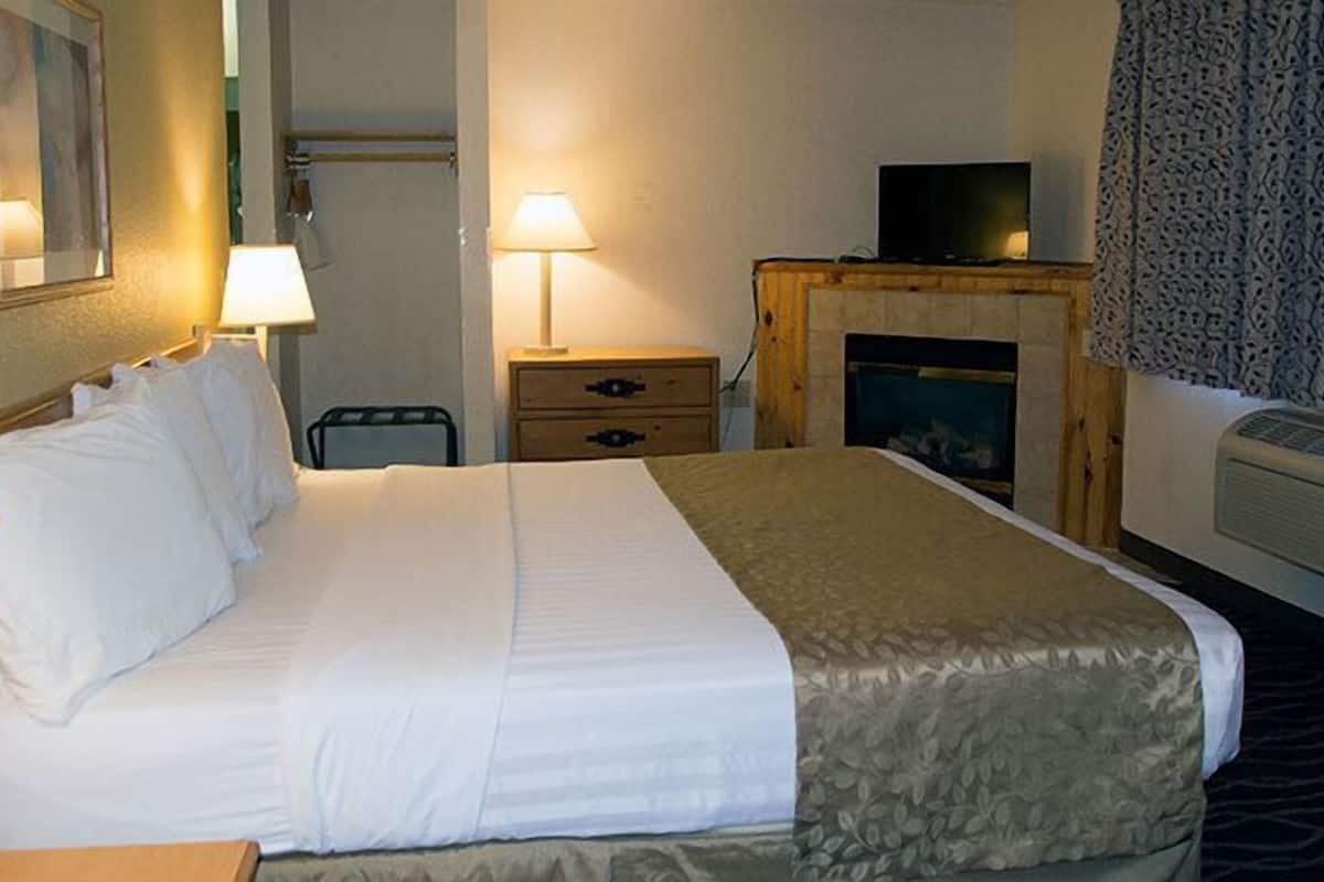 desk, blackout curtains, iron/ironing board, free cots/infant beds