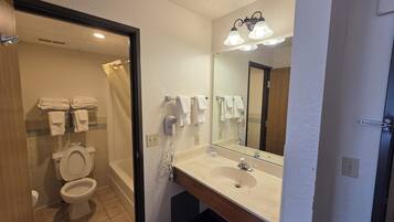 Room, Two Queen Beds, Non Smoking | Bathroom | Shower, free toiletries, hair dryer, towels