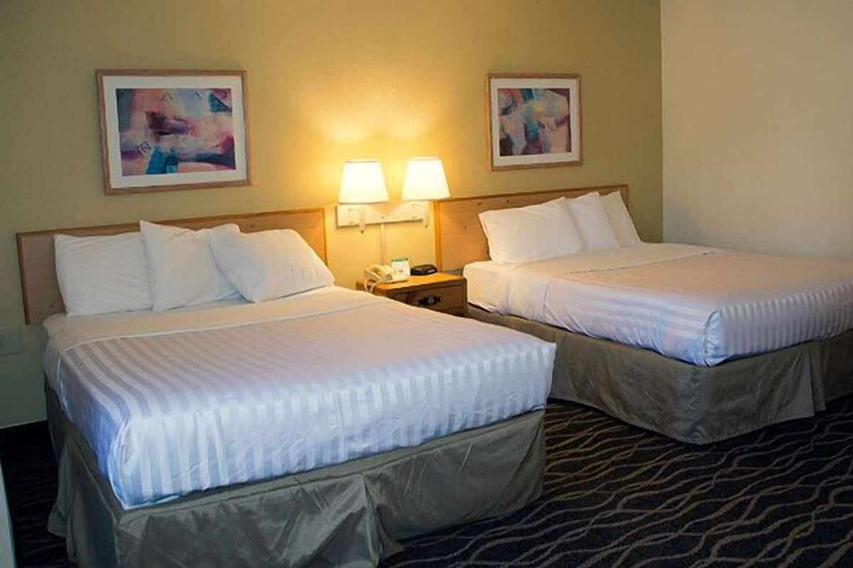 Room, Two Queen Beds, Non Smoking | Desk, blackout drapes, iron/ironing board, free cribs/infant beds