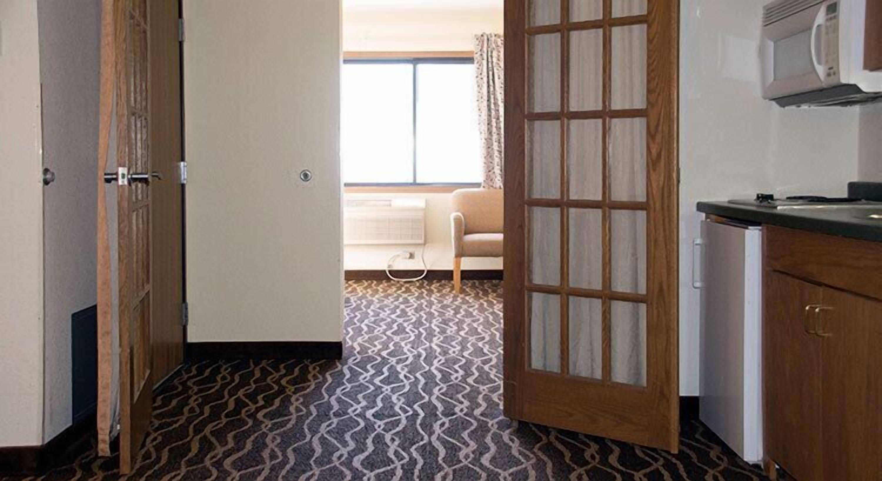 desk, blackout curtains, iron/ironing board, free cots/infant beds