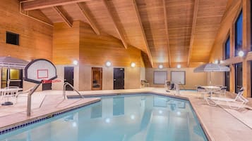Indoor pool, open 6:00 AM to midnight, pool loungers