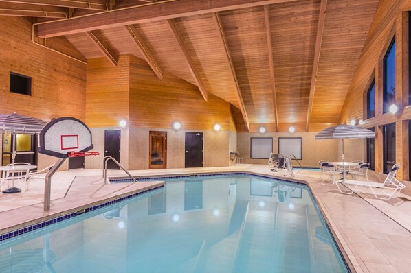 Indoor pool, open 6:00 AM to midnight, pool loungers