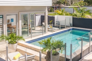2 outdoor pools, open 9:00 AM to 9 PM, pool umbrellas