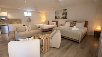 Family Studio Suite | Living area | 42-inch TV with digital channels, Netflix