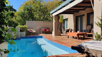 Outdoor pool, pool umbrellas, pool loungers