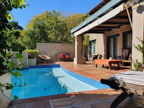 Outdoor pool, pool umbrellas, sun loungers