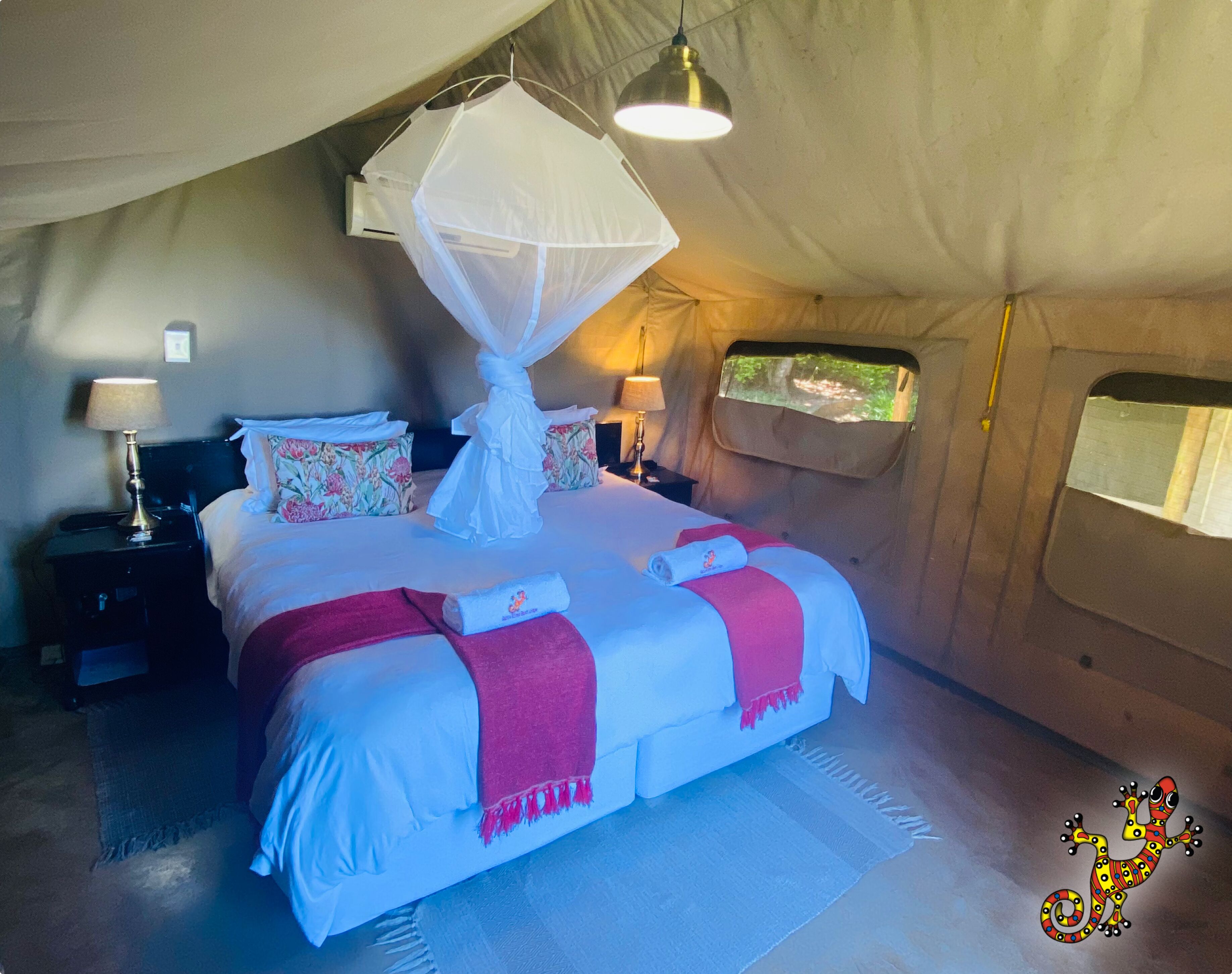 Luxury Tent, Shared Bathroom, River View | In-room safe, desk, blackout curtains, iron/ironing board