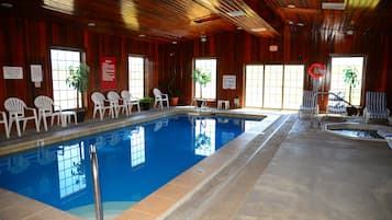 Indoor pool, open 8:00 AM to 10:00 PM, pool loungers