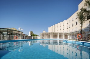 Seasonal outdoor pool, pool umbrellas, sun loungers