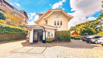 Experience the classic European charm of Chateau de Lior, where a serene environment and welcoming courtyard entrance set the tone for a relaxing stay.