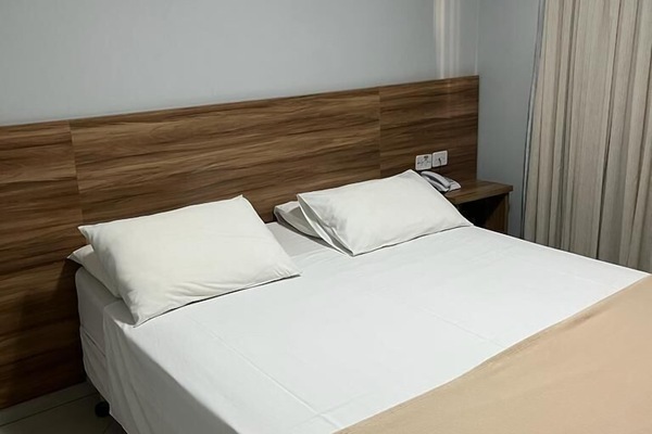 Luxe beddengoed, een minibar, een bureau, gratis wifi