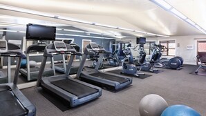 A gym with treadmills, elliptical machines, and exercise balls. - WorldMark Steamboat Springs (Steamboat Springs)