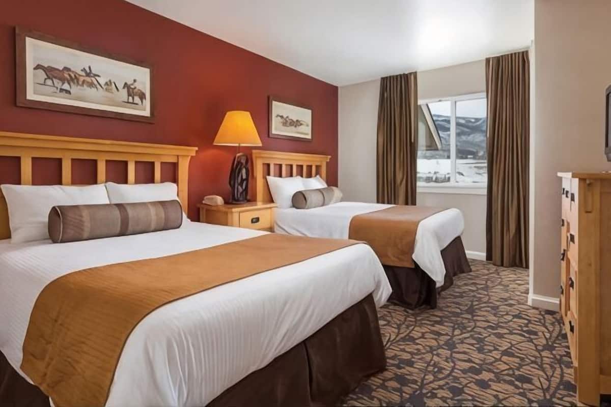 In-room safe, iron/ironing board, WiFi (surcharge), bed sheets