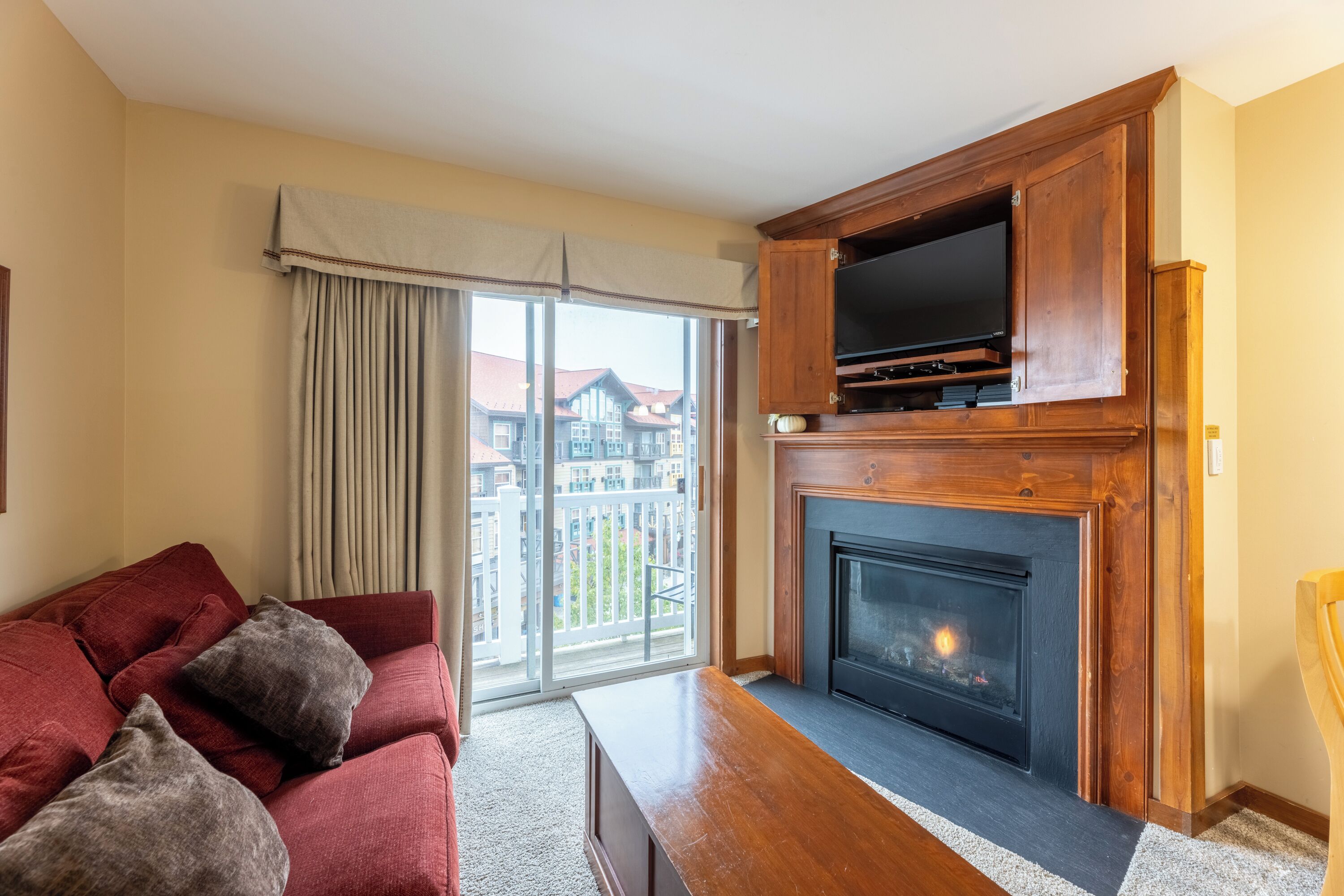 studio | living area | 1-inch tv with cable channels, fireplace