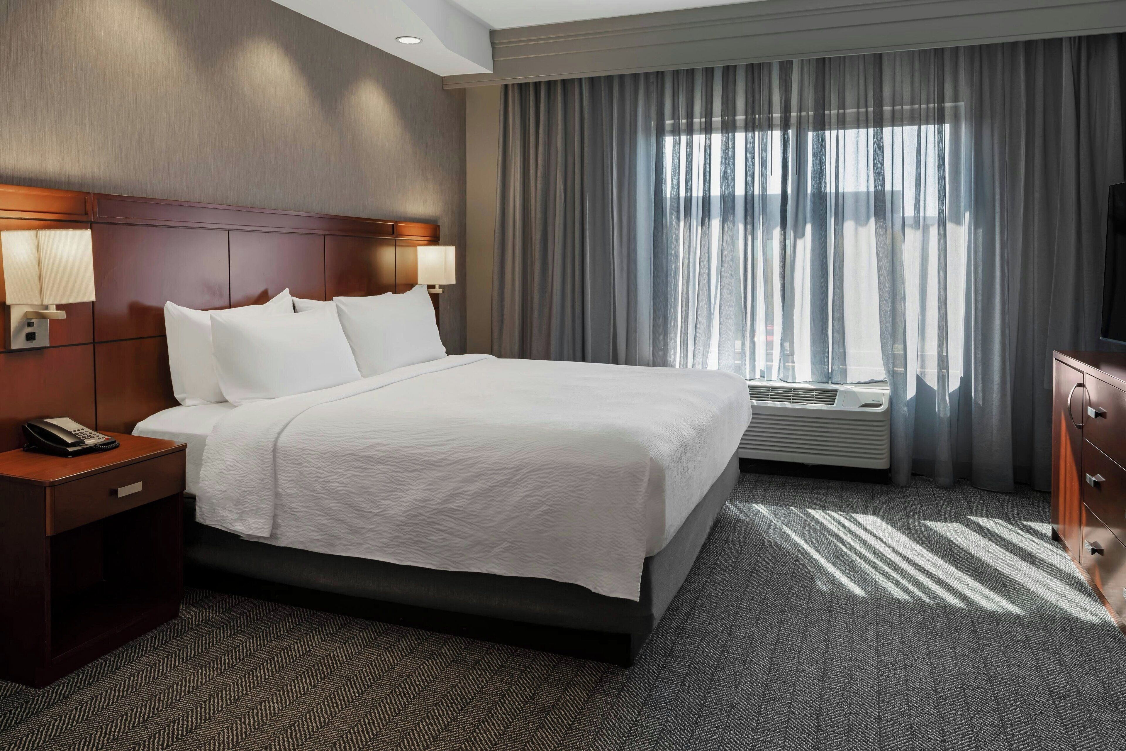 down duvets, desk, laptop workspace, blackout curtains