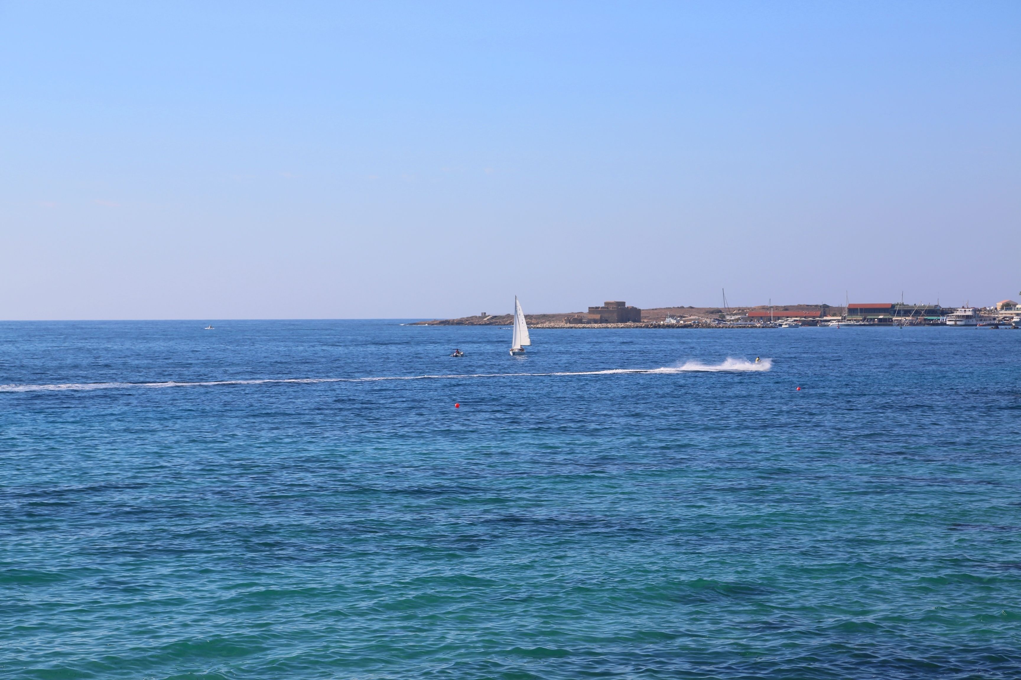 on the beach, sun-loungers, beach umbrellas, beach towels