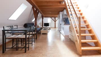 Deluxe Apartment | Living area | Flat-screen TV, DVD player