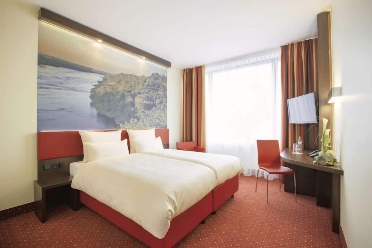 In-room safe, individually furnished, desk, blackout curtains