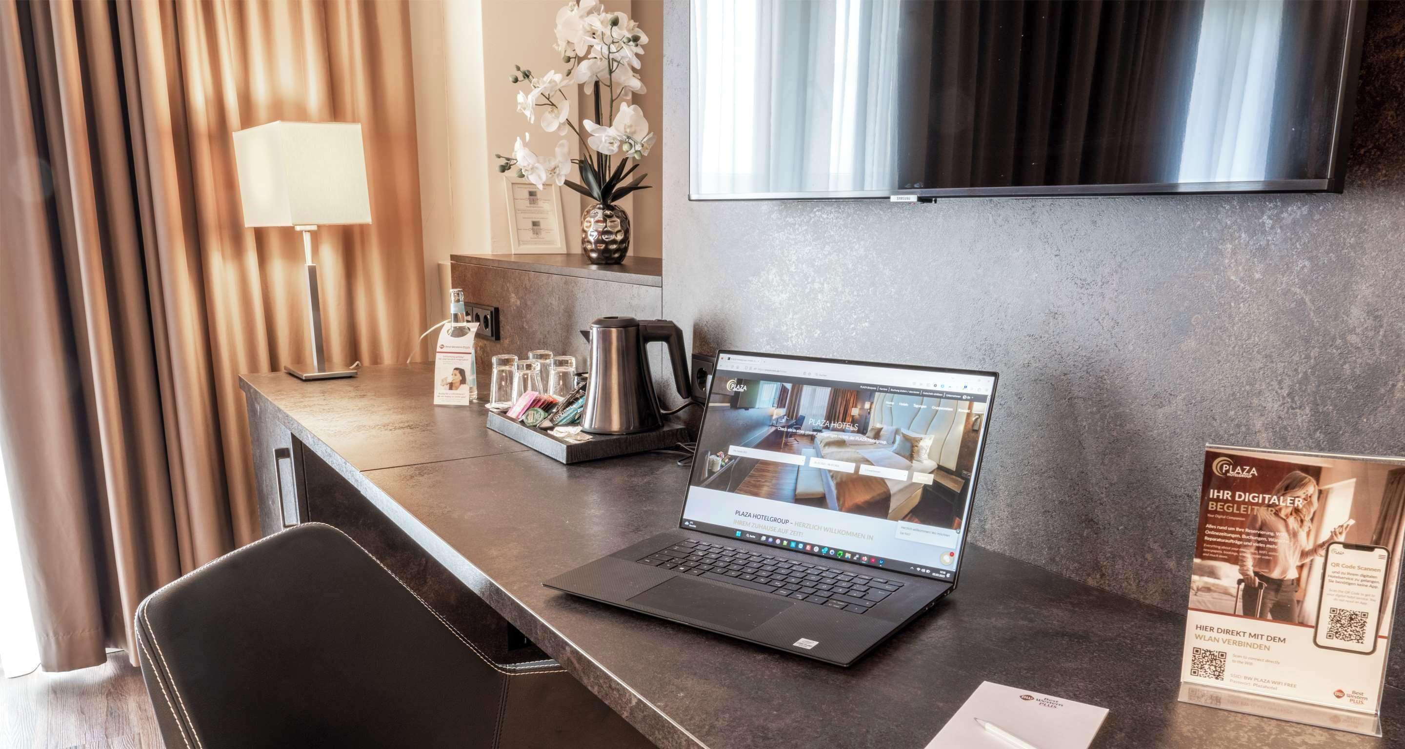 suite, 1 queen bed (quiet location;separate living room) | in-room safe, individually furnished, desk, blackout curtains