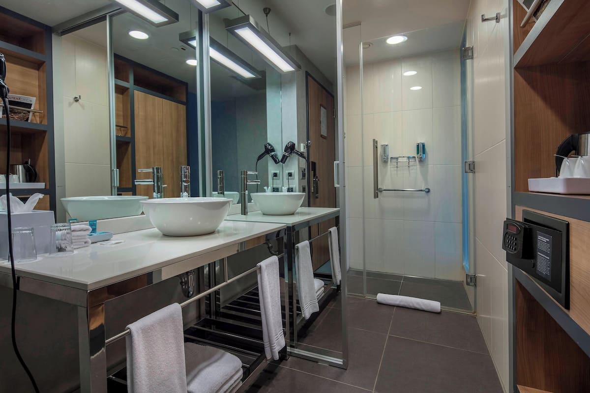 aloft, room, 2 single beds, non smoking | bathroom | shower, rainfall showerhead, hair dryer, towels