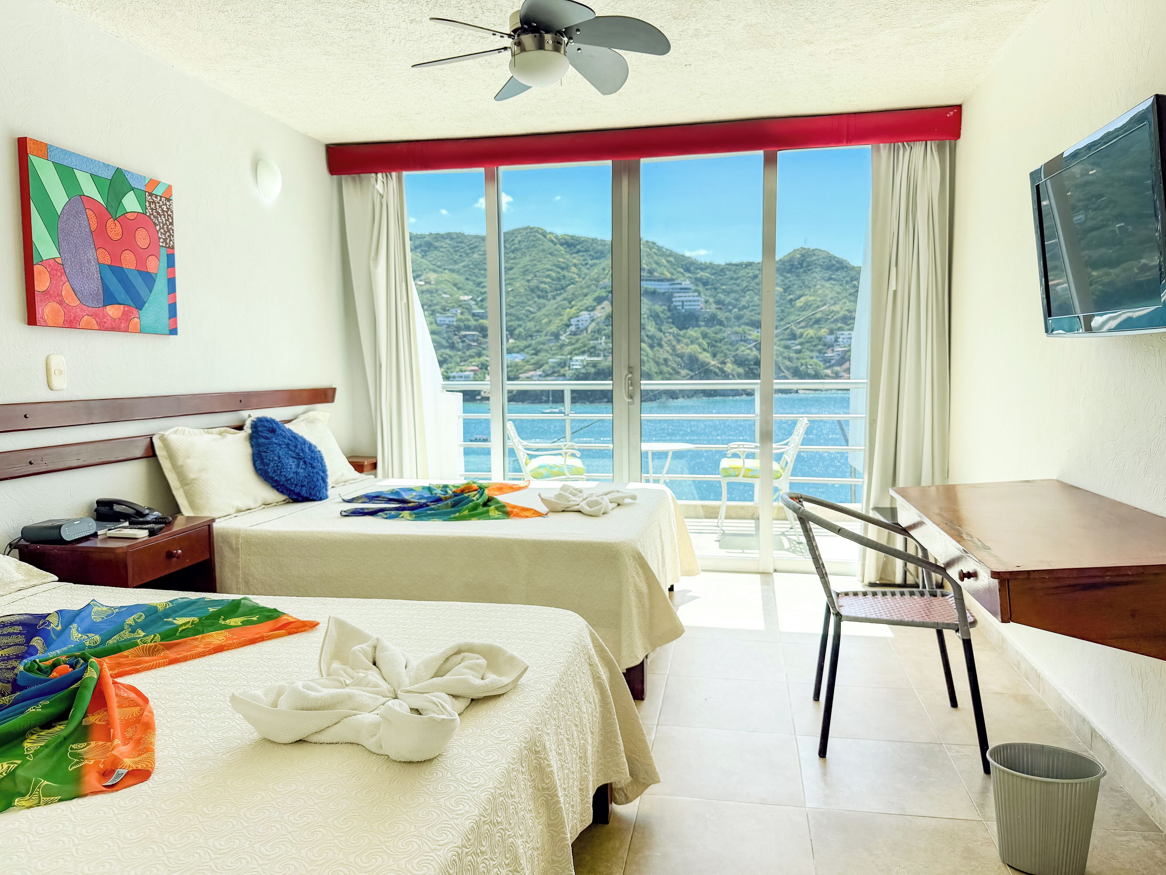 Deluxe-Vierbettzimmer, Meerblick | Zimmersafe, Verdunkelungsvorhänge, kostenloses WLAN, Bettwäsche