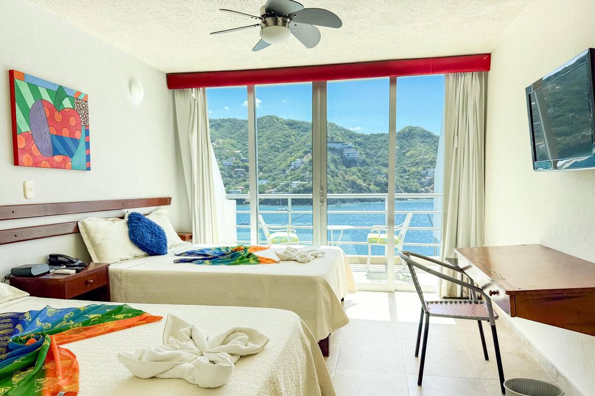 Cofres nos quartos, cortinas blackout, Wi-Fi de cortesia, roupa de cama