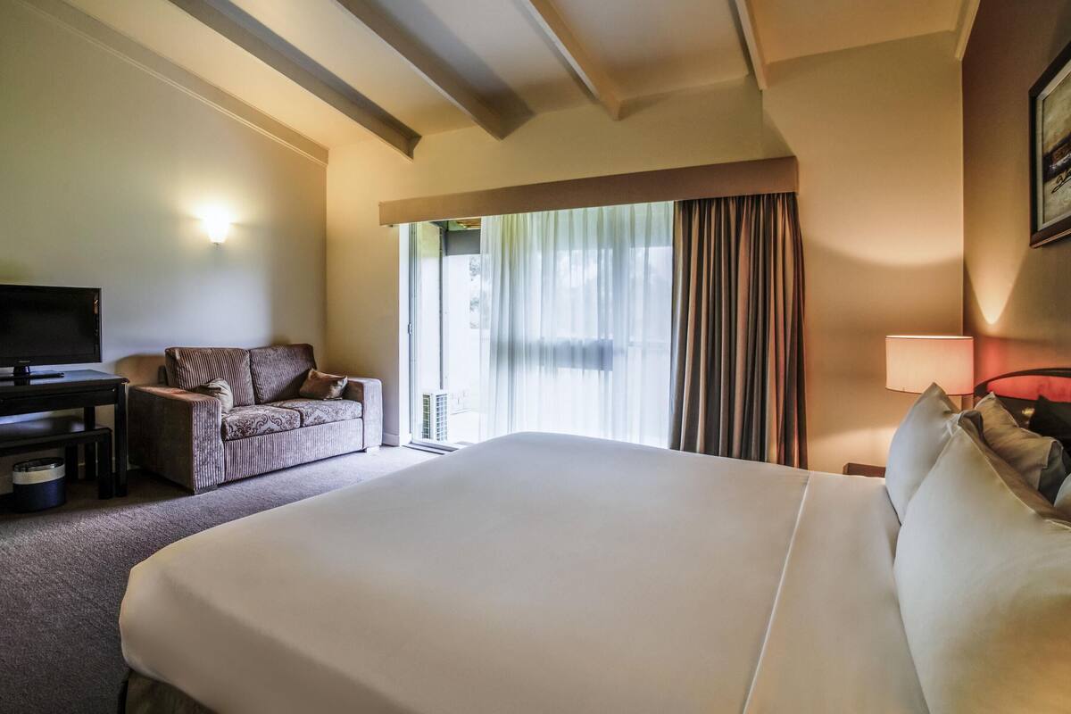 Chambre Double Standard, 1 lit double | Surmatelas, fer et planche à repasser, lits bébé (en supplément)