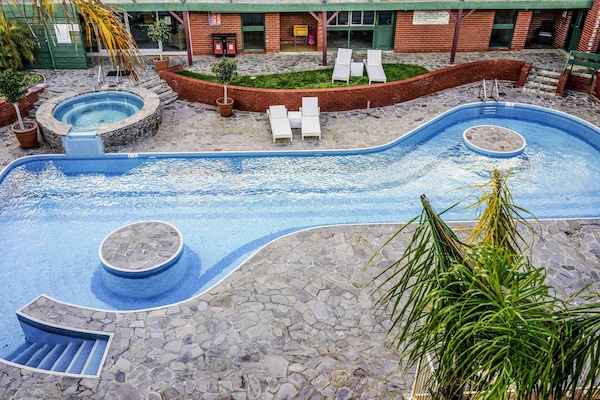 Outdoor pool, open 8:00 AM to 8:00 PM, pool loungers