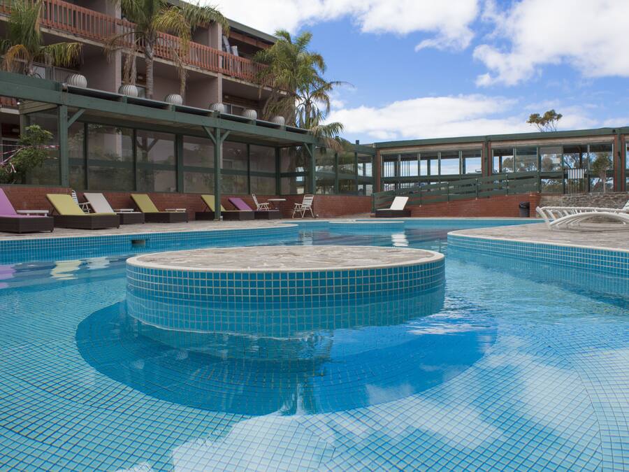 Outdoor pool, open 8:00 AM to 8:00 PM, pool loungers