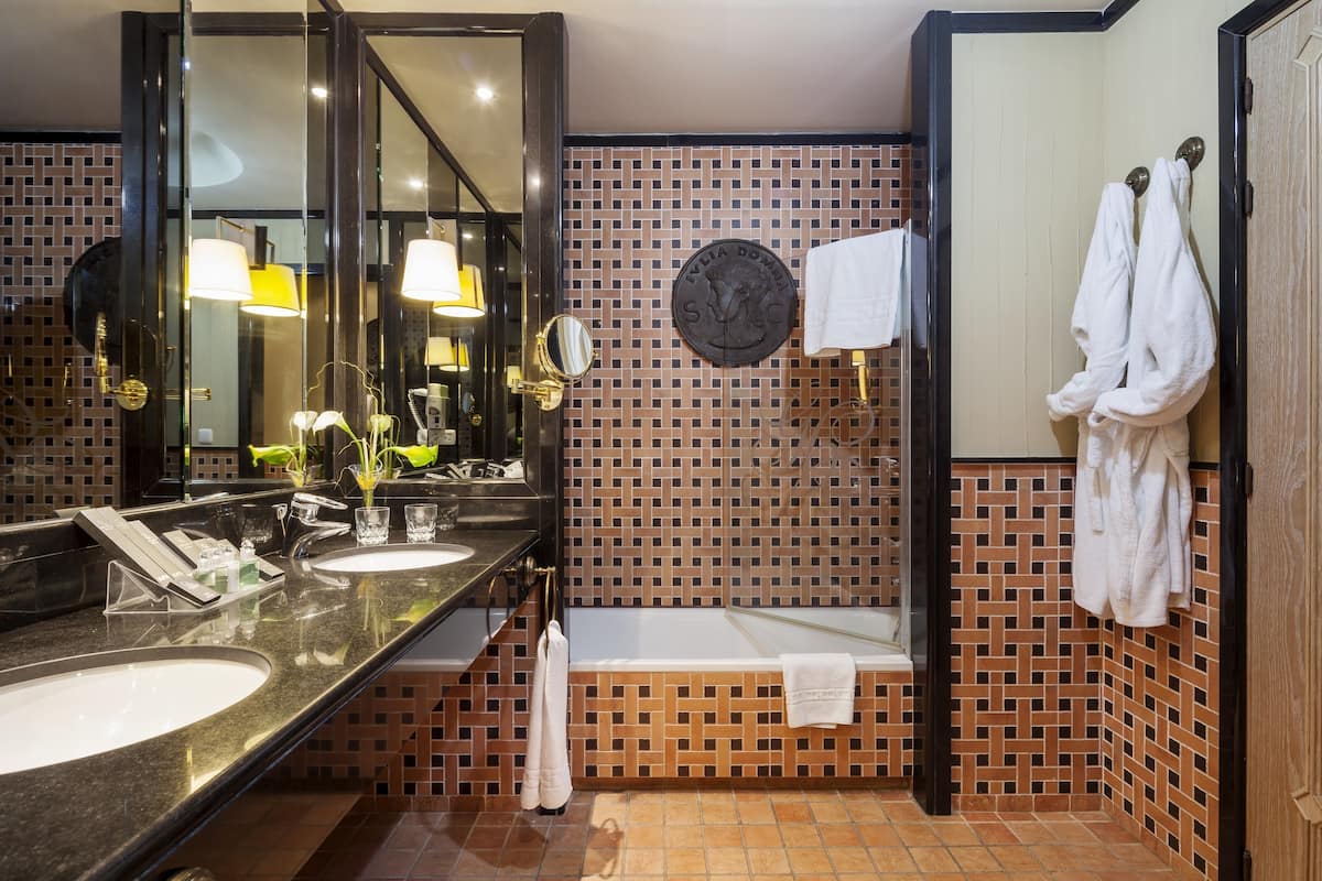 eco-friendly toiletries, hair dryer, towels