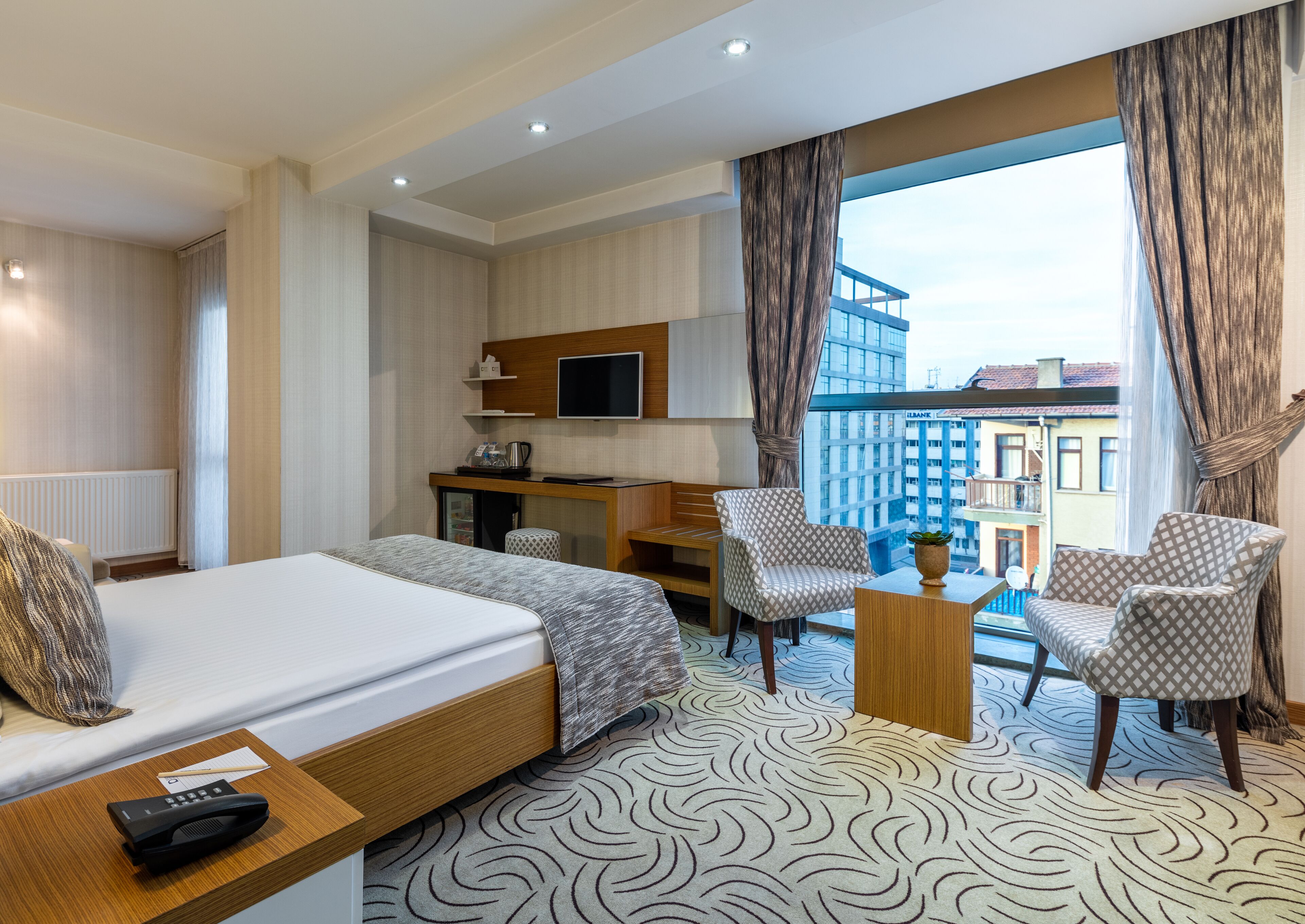 standard single room | memory-foam beds, minibar, in-room safe, desk