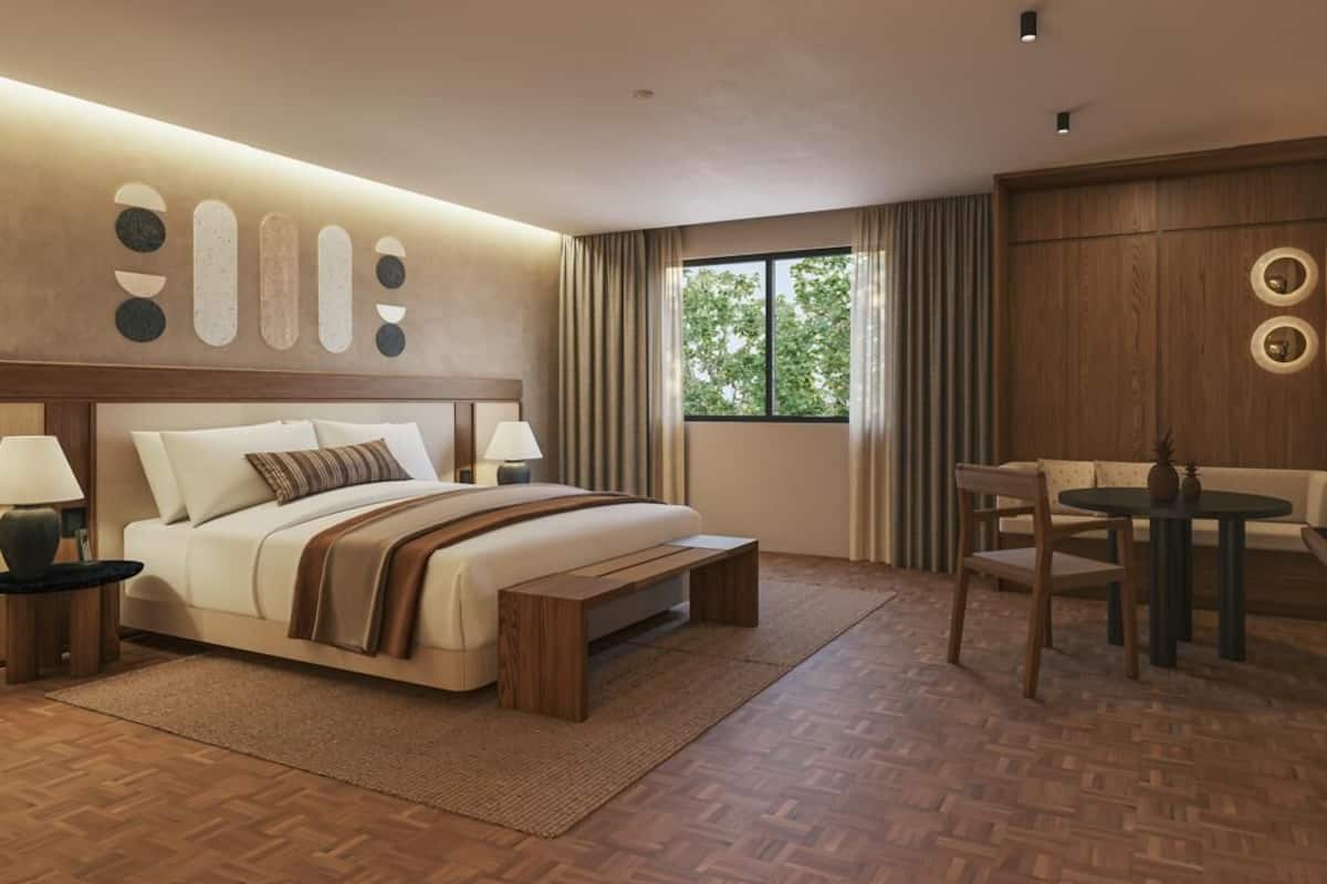 Ropa de cama de alta calidad y caja de seguridad en la habitación