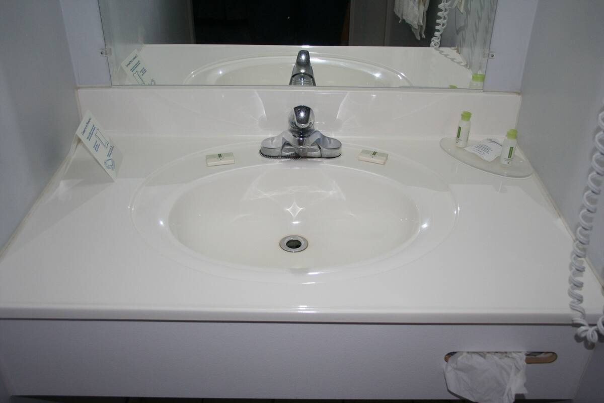 grand suite, 2 queen beds | bathroom sink