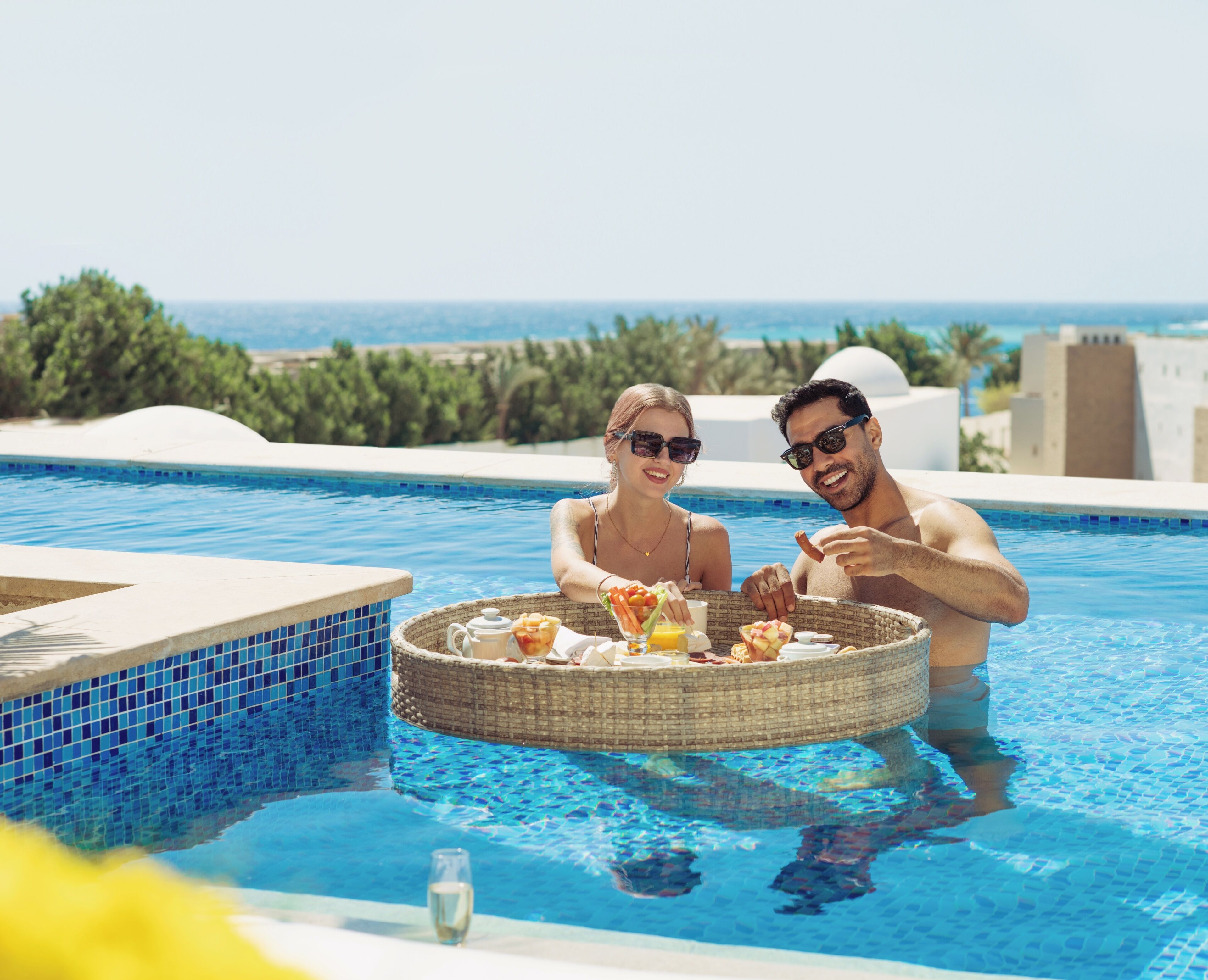 6 outdoor pools, open 7:00 AM to 6:30 PM, pool umbrellas, pool loungers