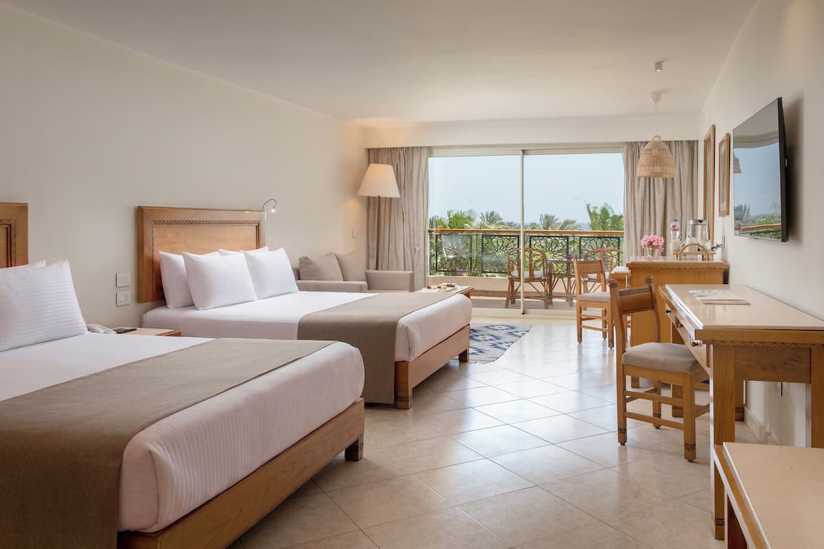 Premium Room with Sea View - West Bay (Adults Only) | Minibar (some free items), in-room safe, desk, blackout drapes
