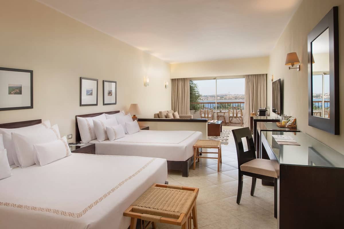 Junior Suite - West Bay (Adults Only) | Minibar (some free items), in-room safe, desk, blackout drapes