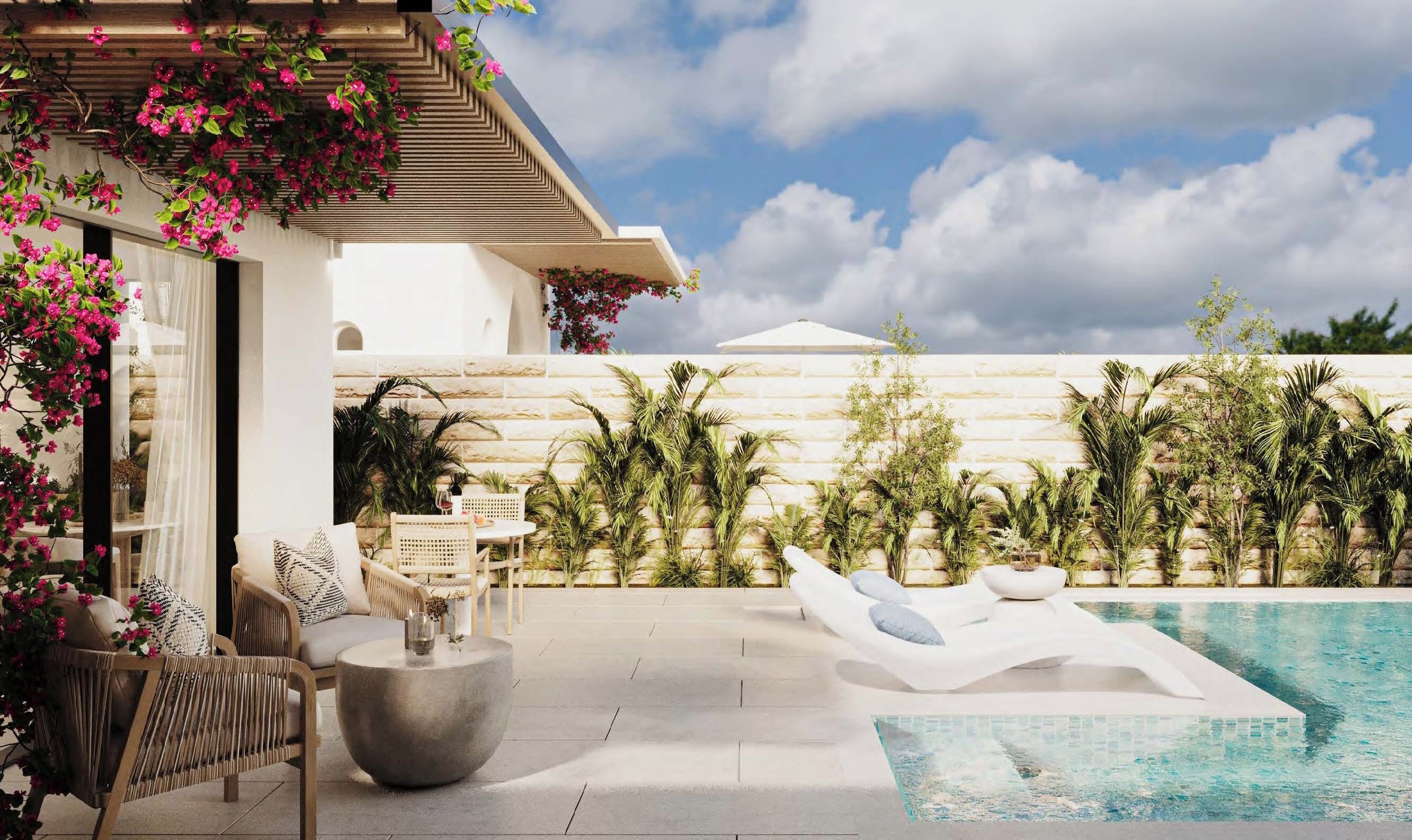 A poolside area with lounge chairs, a dining table, and a seating area with a view of the pool.