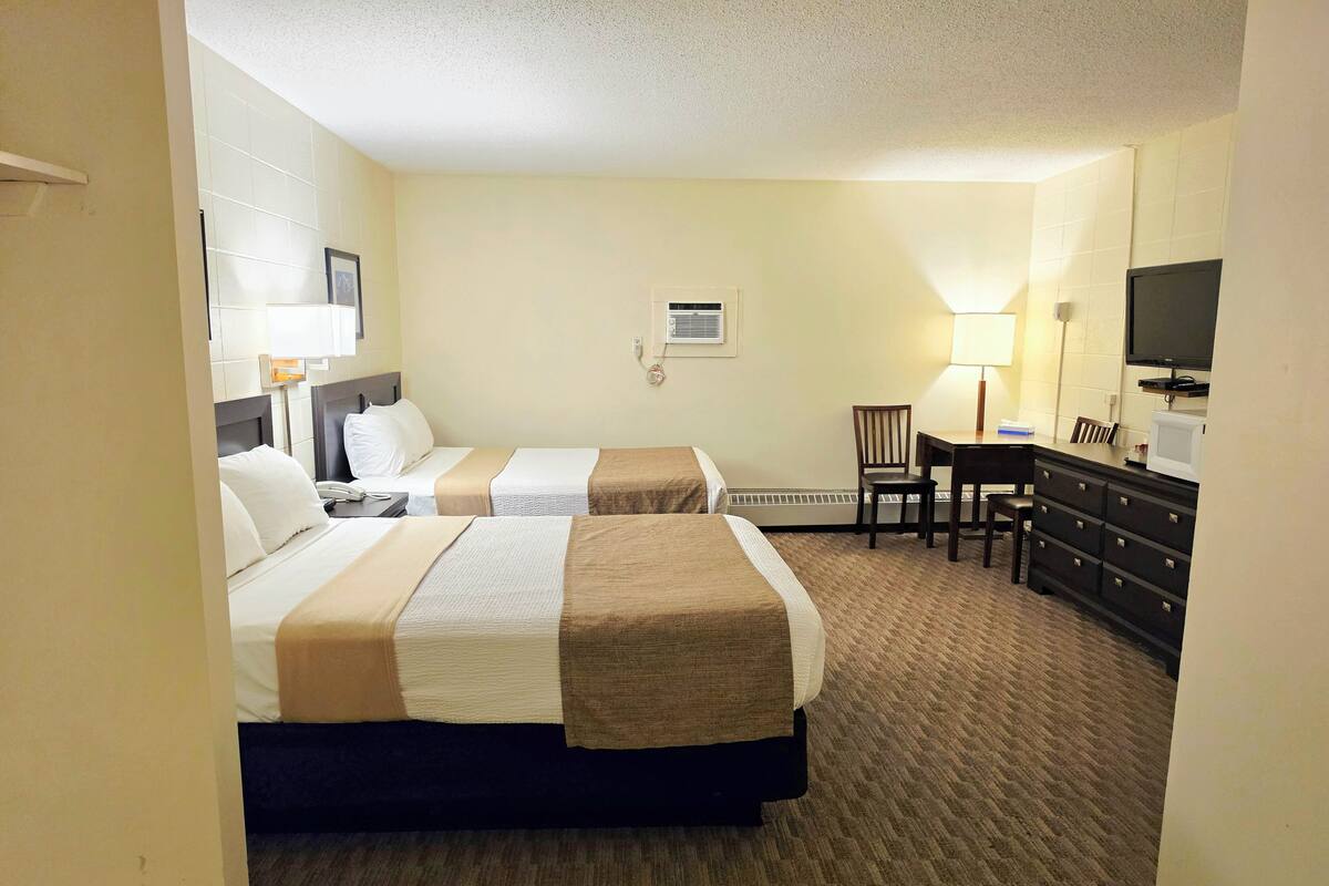 Standard Room, 2 Queen Beds | Desk, soundproofing, iron/ironing board (on request), WiFi (free)