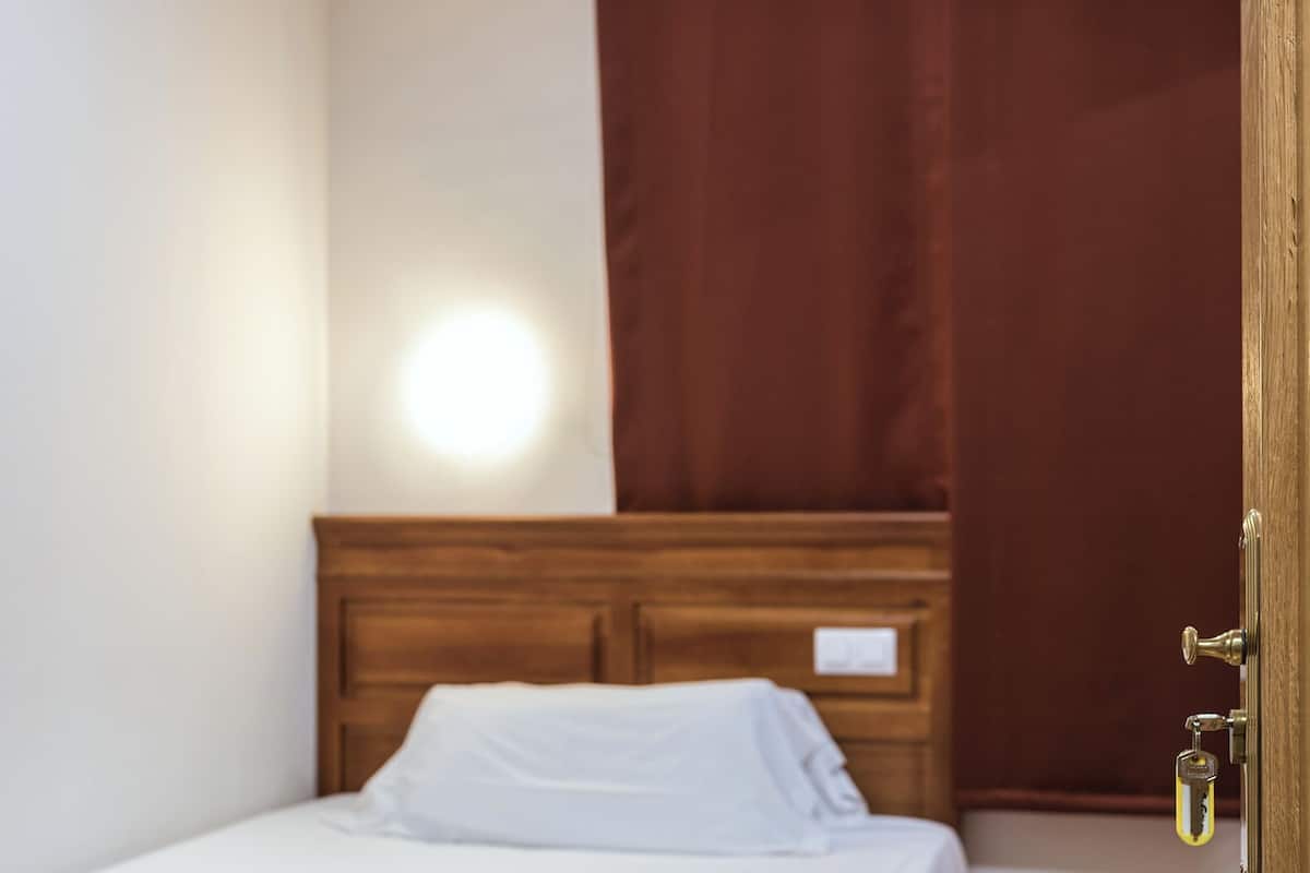 Down comforters, desk, laptop workspace, blackout drapes