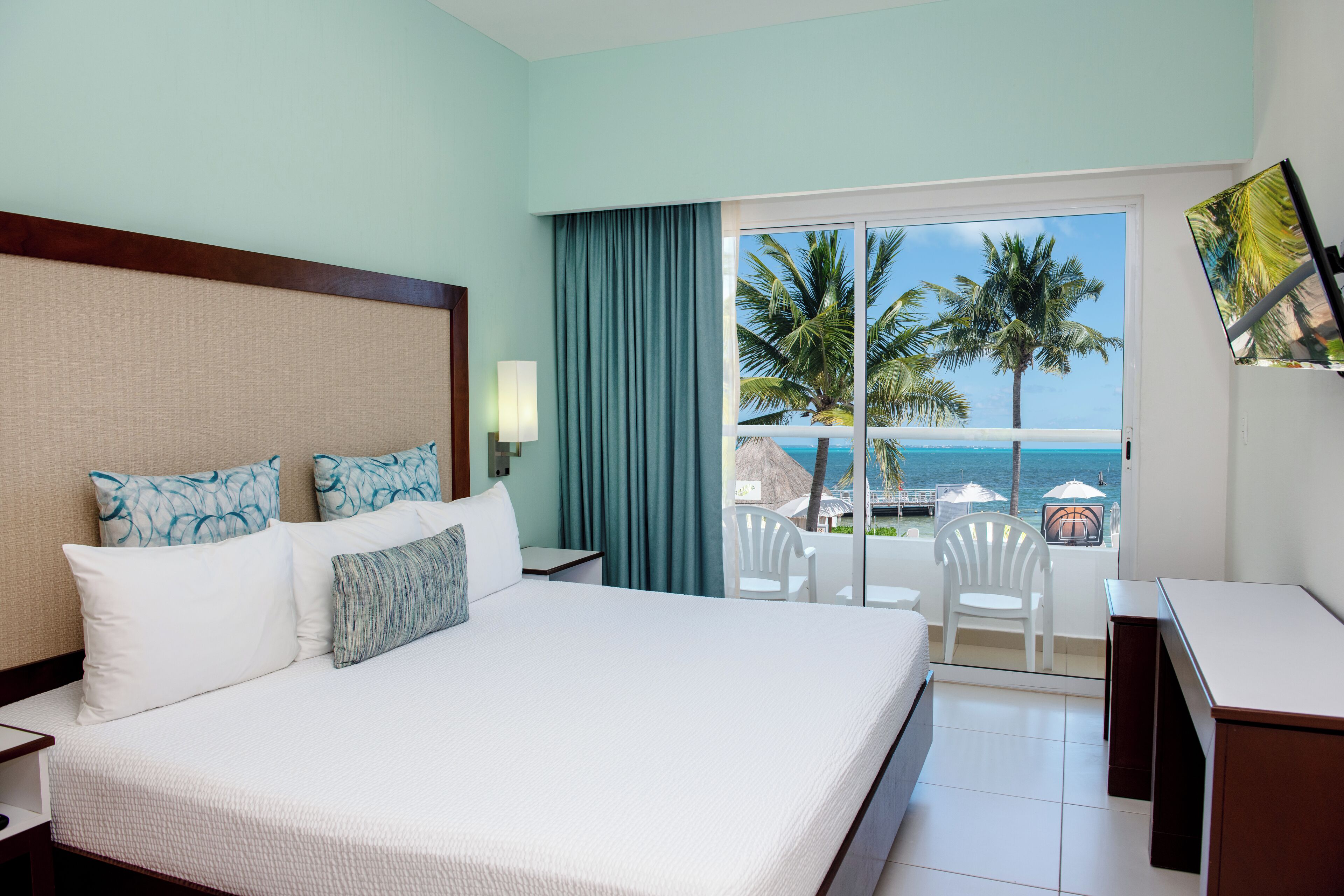 Superior Room, Ocean View | Minibar, in-room safe, individually decorated, blackout drapes