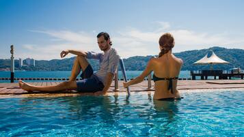 2 outdoor pools, pool umbrellas, sun loungers