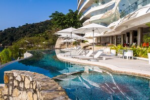 2 outdoor pools, pool umbrellas, sun loungers