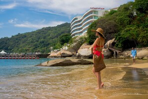 Strandhåndklær, snorkling og kajakkpadling