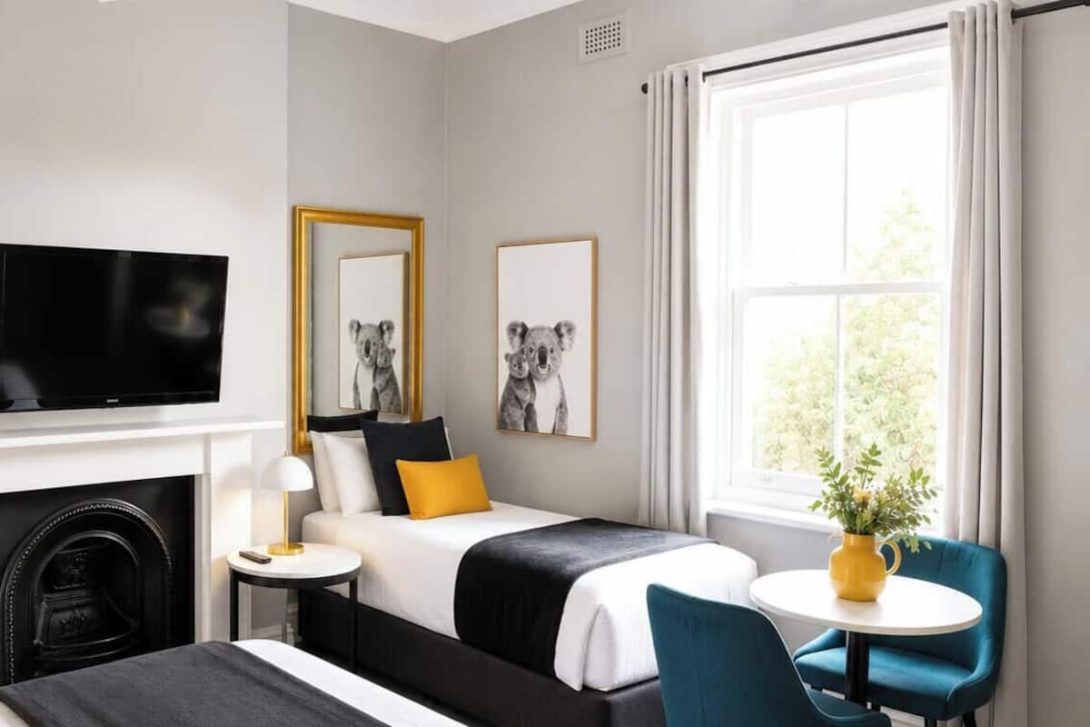 Queen with Single Bed and Private Bathroom | Premium bedding, individually decorated, individually furnished