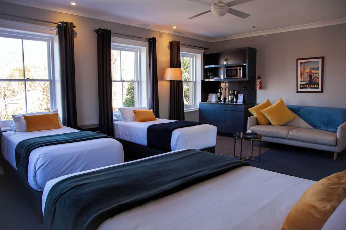 Family Room | Premium bedding, individually decorated, individually furnished, desk