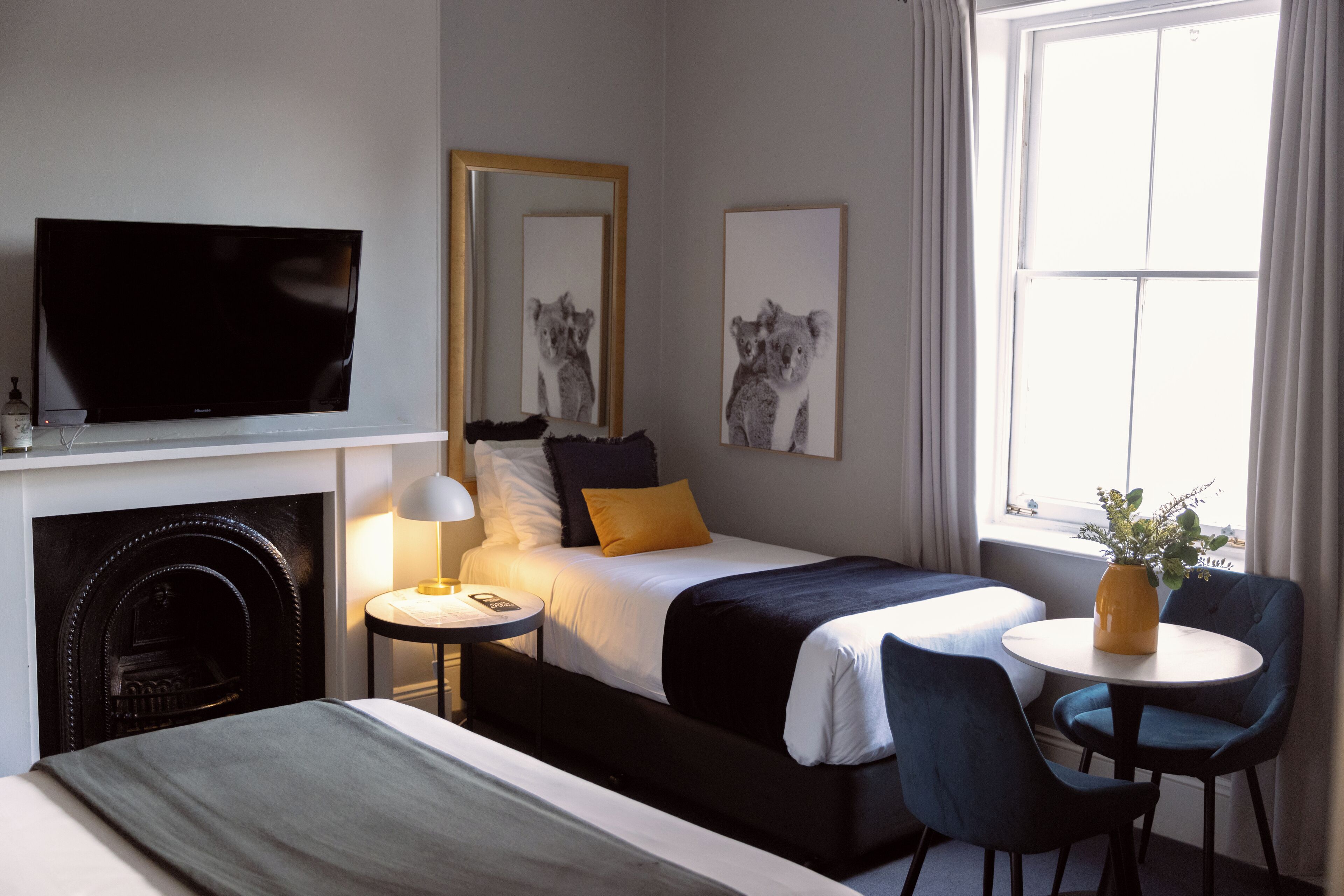 Queen with Single Bed and Private Bathroom