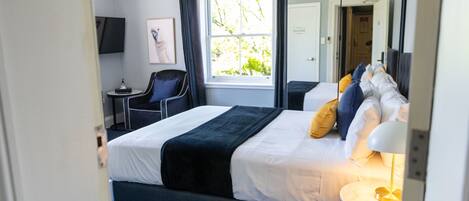 Queen Room with Private Bathroom | Premium bedding, individually decorated, individually furnished