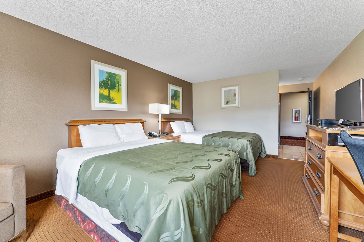 Down comforters, desk, blackout drapes, soundproofing